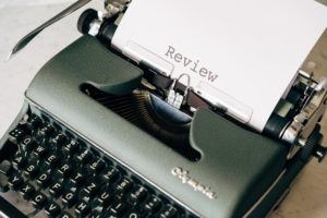 type writer writing about part of why you need Online Reputation management